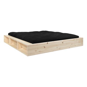 Dvojlôžková posteľ z masívneho dreva s úložným priestorom a čiernym futonom Comfort Mat Karup Design Ziggy, 180 x 200 cm
